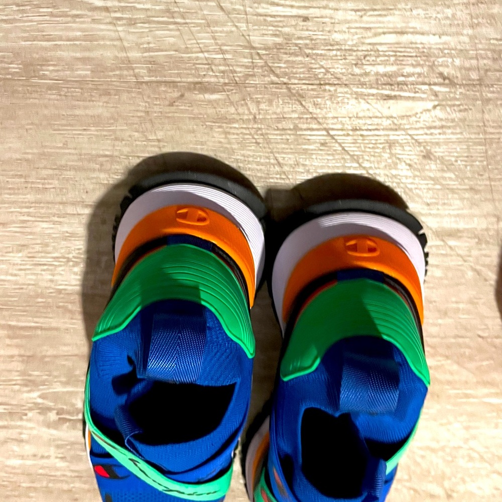 Men’s size 13 athletic shoes. New and gently used.